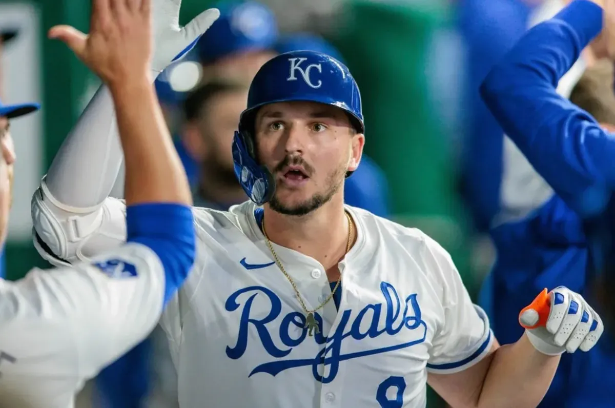 Apr 10, 2024; Kansas City, Missouri, USA; Kansas City Royals first base Vinnie Pasquantino (9) celebrates in the dugout during the fourth inning after hitting a home run against the Houston Astros at Kauffman Stadium. credits: William Purnell-USA TODAY Sports