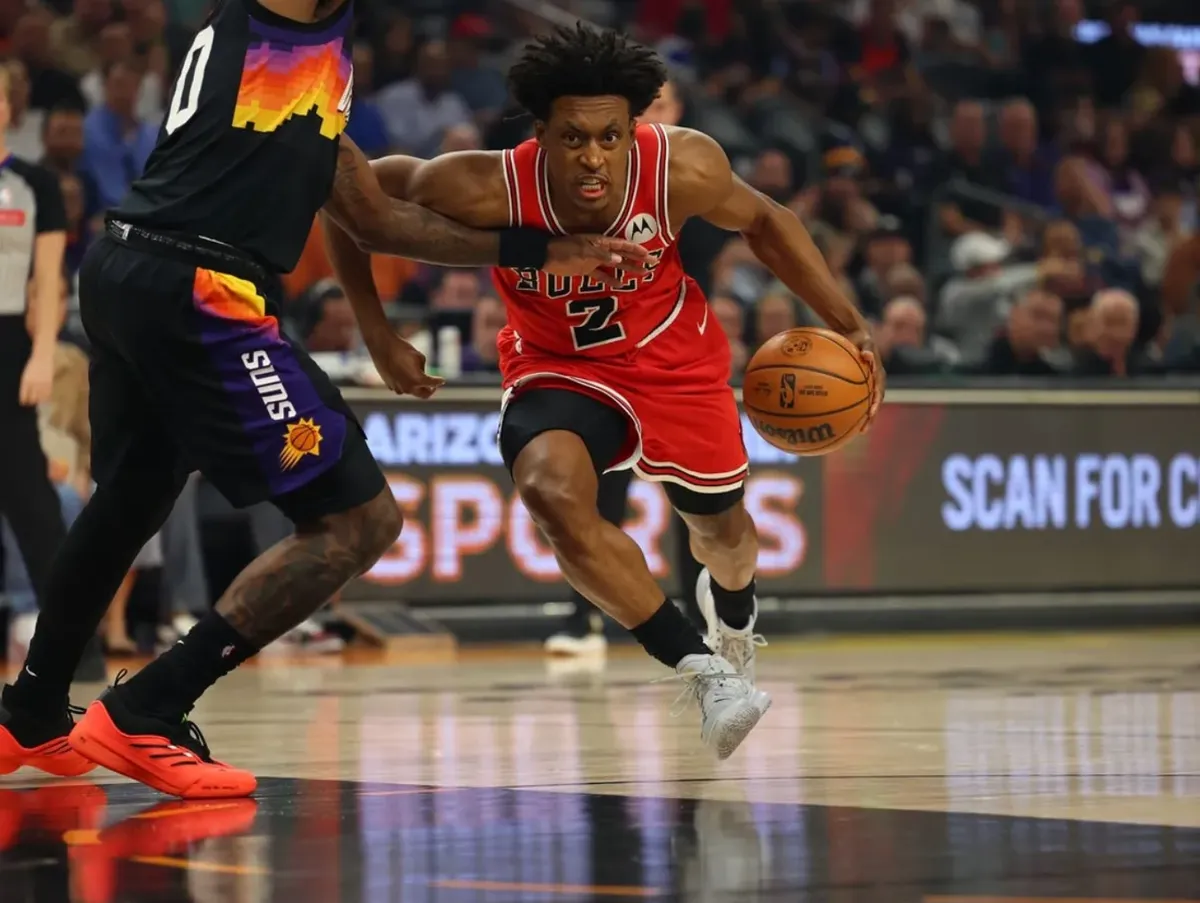 Mar 5, 2026; Phoenix, Arizona, USA; Chicago Bulls guard Collin Sexton (2) dribbles down court against Phoenix Suns forward Ryan Dunn (0) during the first quarter at Mortgage Matchup Center. Mandatory Credit: Anna Carrington-Imagn Images