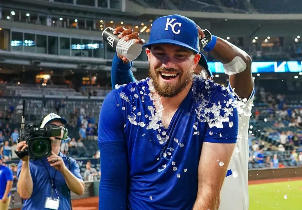 Jul 20, 2026; Kansas City, Missouri, USA; Kansas City Royals third baseman Nick Loftin (12) is doused with water after hitting a walk off bunt during the ninth inning against the San Francisco Giants at Kauffman Stadium. Mandatory Credit: Denny Medley-Imagn Images