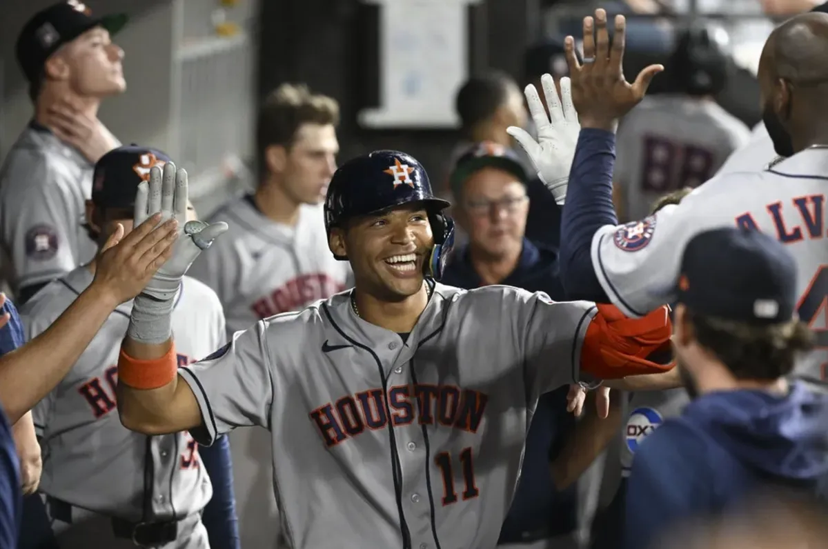 Jul 24, 2026; Chicago, Illinois, USA; Houston Astros right fielder Cam Smith (11) celebrates in the dugout after scoring a two run home run during the sixth inning against the Chicago White Sox at Rate Field. Mandatory Credit: Matt Marton-Imagn Images