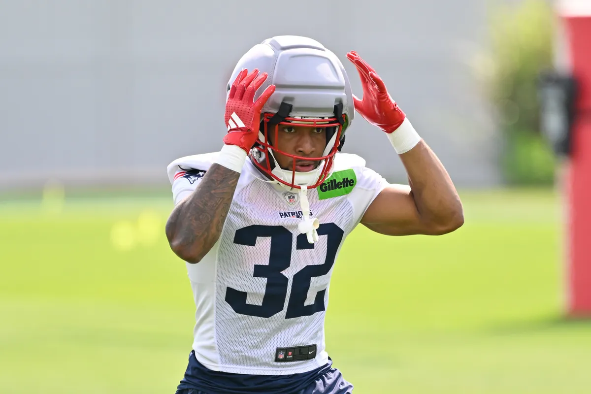 Jul 28, 2026; Foxborough, MA, USA; New England Patriots running back Treveyon Henderson (32) walks to practice for training camp at Gillette Stadium. Mandatory Credit: Eric Canha-Imagn Images