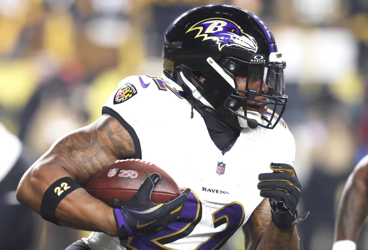Jan 4, 2026; Pittsburgh, Pennsylvania, USA; Baltimore Ravens running back Derrick Henry (22) carries the ball against the Pittsburgh Steelers during the first quarter at Acrisure Stadium. Mandatory Credit: Charles LeClaire-Imagn Images