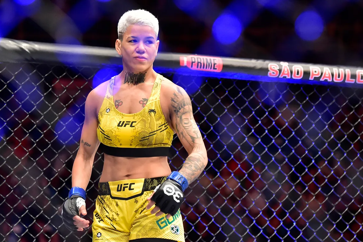 Nov 4, 2023; Sao Paulo, Brazil; Denise Gomes (blue gloves) prepares to fight Angela Hill (not pictured) during UFC Fight Night at Ibirapuera Arena. Mandatory Credit: Jason da Silva-USA TODAY Sports