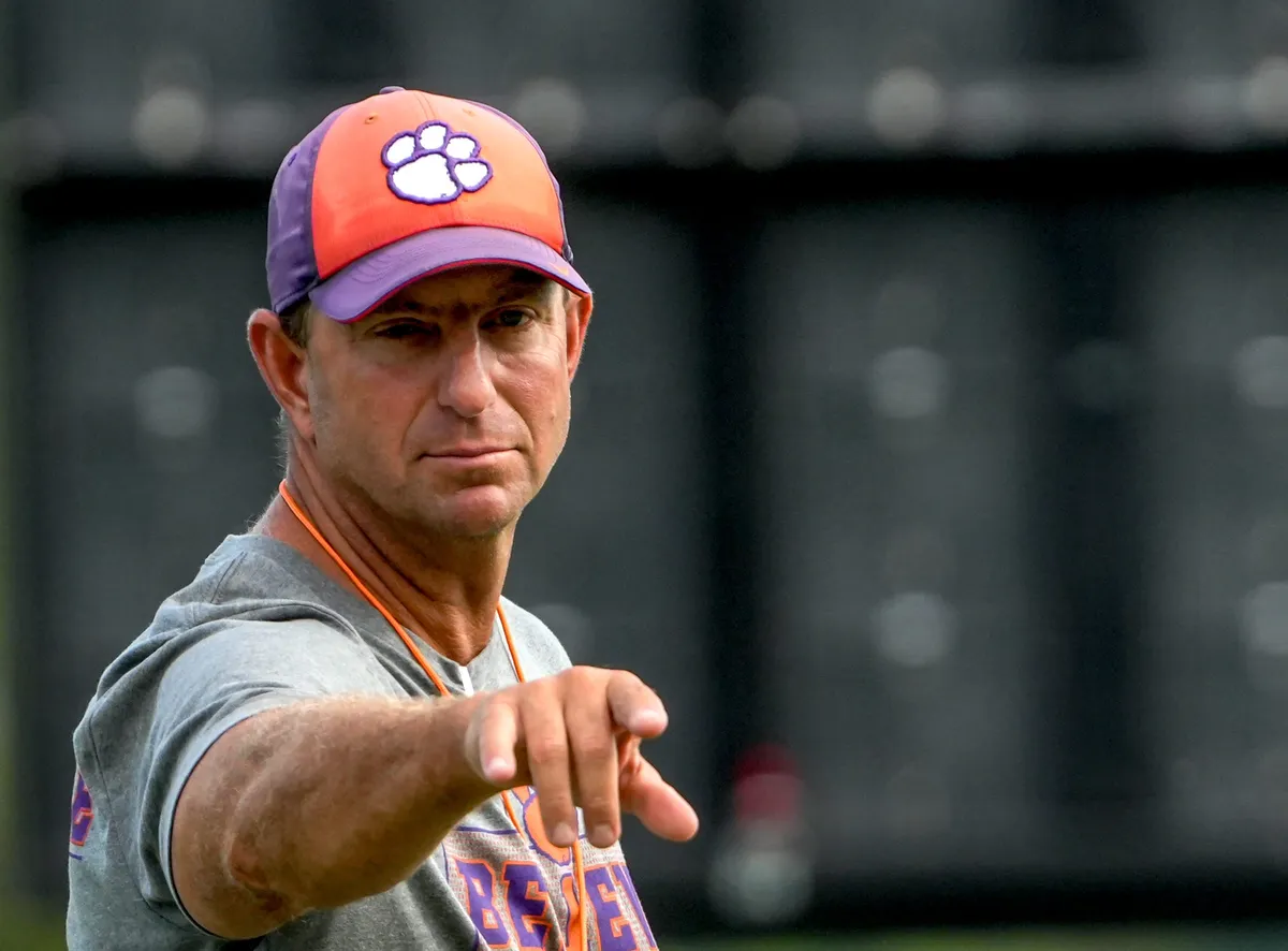 Clemson head coach Dabo Swinney communicates with players during practice in the at the Allen N. Reeves Sports Complex in Clemson, S.C. Friday, August 7, 2026.