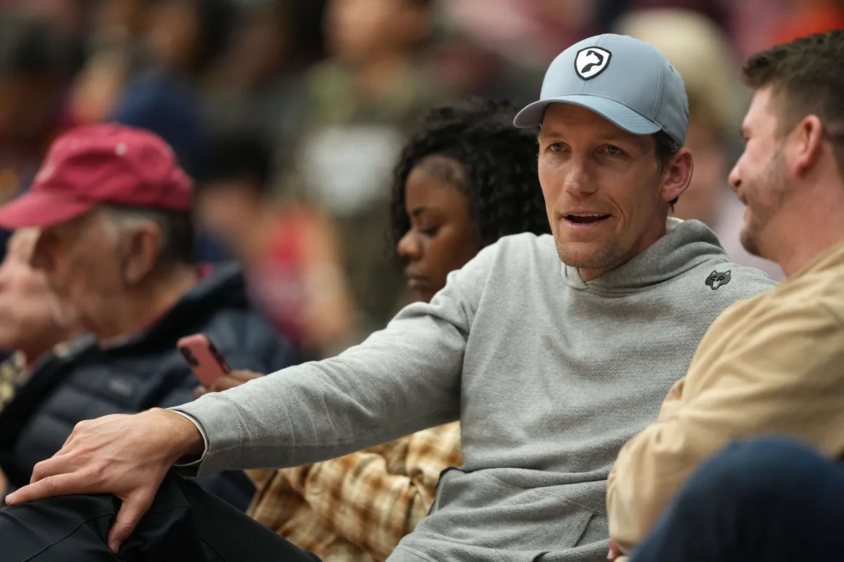 Dec 27, 2025; Stanford, California, USA; Golden State Warriors general manager Mike Dunleavy Jr. sits courtside during the second half of the game between the Stanford Cardinal and the CSUN Matadors at Maples Pavilion. Mandatory Credit: Darren Yamashita-Imagn Images