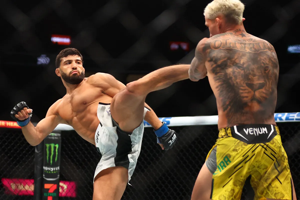 Apr 13, 2024; Las Vegas, Nevada, USA; Arman Tsarukyan (blue gloves) fights Charles Oliveira (red gloves) during UFC 300 at T-Mobile Arena. Mandatory Credit: Mark J. Rebilas-USA TODAY Sports