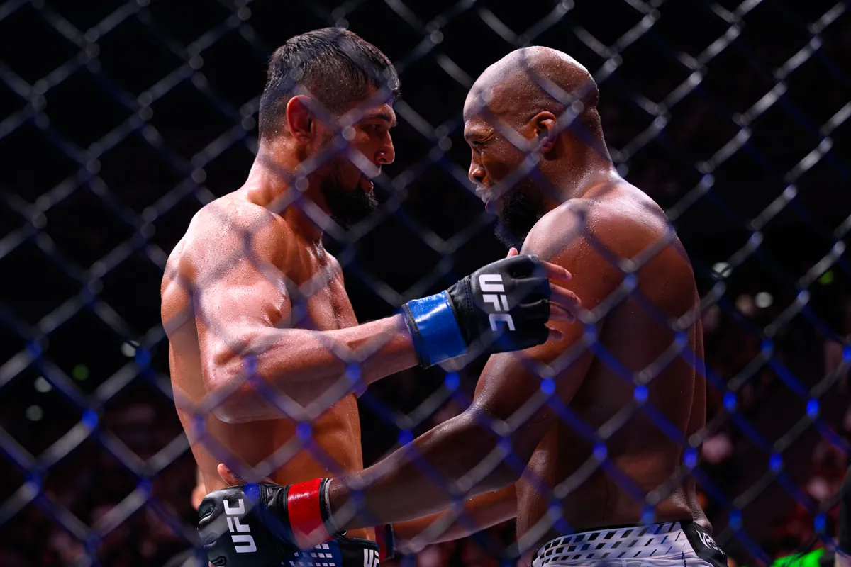 Sep 5, 2026; Paris, FRANCE; Michael Venom Page (red gloves) fights Nursulton Ruziboev (blue gloves) during UFC Fight Night at Accor Arena. Mandatory Credit: Per Haljestam-Imagn Images